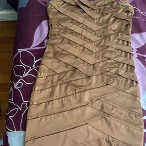 Only worn like 3 times the dress is strapless